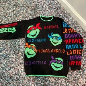 The most adorable  vintage teenage mutant ninja Turtles sweater.